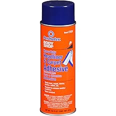 Image of the Permatex Heavy Duty Headliner Adhesive can in its signature blue and orange color scheme. It is placed next to a car interior model, emphasizing its use for upholstery and headliner repairs.